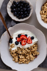 Healthy breakfast concept. Granola with yogurt and berrires.