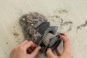 Vacuum cleaner powder on the house ground.