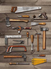 Old carpenter DIY hand tools on wood