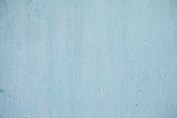 background and texture of old concrete wall with cracked paint on it