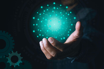 Hand of businessman holding icon for technology and energy concept.