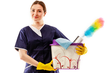 Cleaning concept. Young woman holds basin with washing fluids and rags in hands
