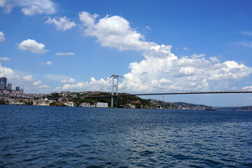 Naklejka premium Bosphorus bridge in Istanbul, blue sky and sea