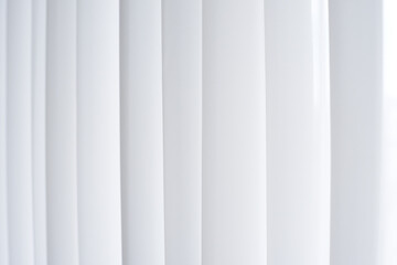 light gray curtain with vertical stripes close-up, background