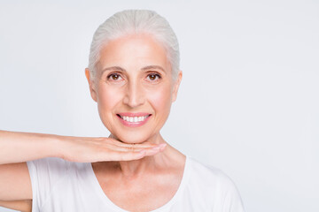 Close-up portrait of her she nice-looking attractive lovely cheerful cheery positive healthy shine gray-haired lady demonstrating perfect elastic flawless skin isolated on light white grey background