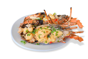 grilled lobaster with cheese called lobster thermidor served on white dish isolated with clipping...