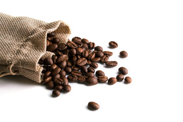 Lots of coffee beans stacked in a beige canvas bag