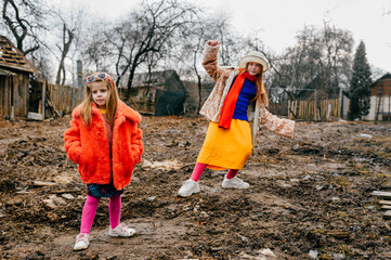 A little cute girl came to her grandmother's house with her older sister for a weekend to take a...