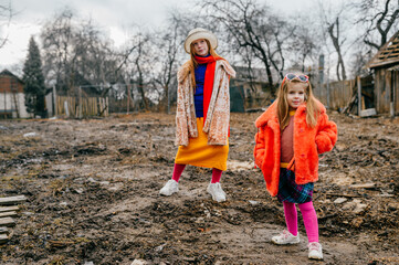 A little cute girl came to her grandmother's house with her older sister for a weekend to take a...