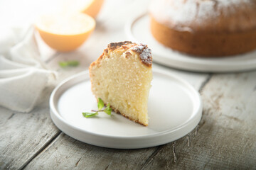 Homemade orange cake on a white plate