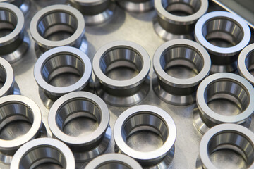 Close up on ball bearings lined up.