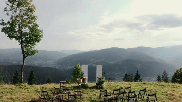 Beautiful wedding arch in the mountains, doors to heaven, doors to the sky