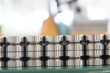 Close up on ball bearings lined up.