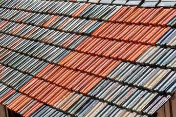 Tile roofed traditional wooden vintage home. Selective focus