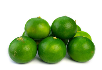Fresh ripe green limes on white background.