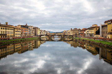View of medieval stone bridge Ponte Vecchio on the Arno river in Florence, Tuscany. Italy