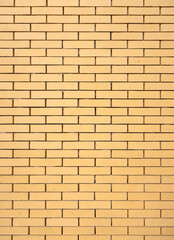 yellow bricks in masonry wall