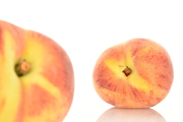 Ripe organic peach, close-up, on a white background