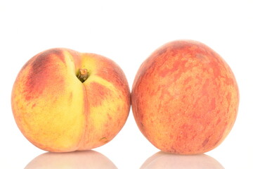 Ripe organic peach, close-up, on a white background