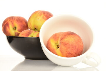 Ripe organic peach, close-up, on a white background