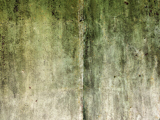 Textured background cracked green paint on an old metal gate. Grungy metal surface. Great background or texture for your project.
