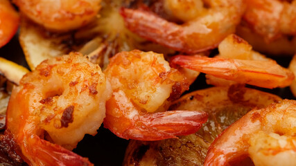 fried shrimps with lemon top view macro