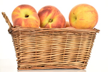 Ripe organic peach, close-up, on a white background