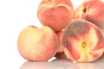 Ripe organic peach, close-up, on a white background