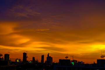 Fototapeta na wymiar Sunset colorful sky building silhouette