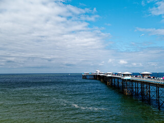 Llandudno pier stretching out into the sea as seen from the Great Orme, in North Wales, United Kingdom.