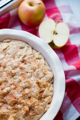 Fresh baked apple pie and apples