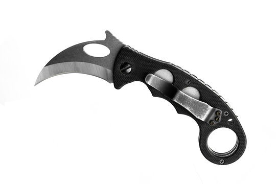 old karambit or claw blade folding knife on white background