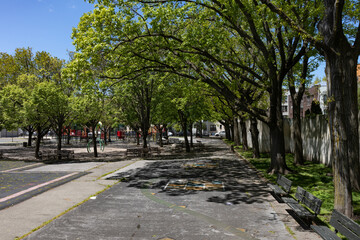 Empty Hoyt Playground with Green Trees during Spring in Astoria Queens New York