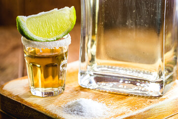 detail of the tequila drink, with a specific focus on the lemon. Typical drink from Mexico.