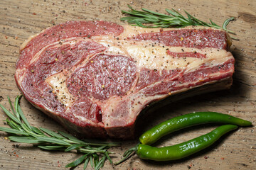 raw cowboy and cowgirl on cutting board