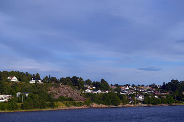 Fototapeta premium Oslofjord. View of the North Sea from Ferry from Horten to Moss connects Ostfold and Vestfold in Norway. Ferry crossing Oslofjord
