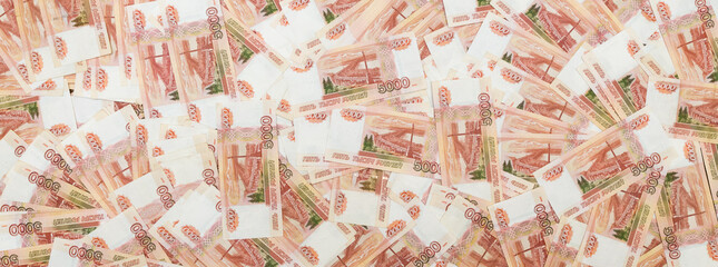 Russian money with a face value of five thousand rubles, Close-up. The concept of Finance. Background and texture of money, top view.