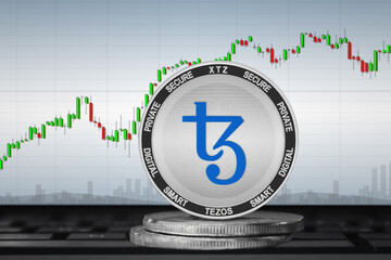 Tezos XTZ cryptocurrency; Tezos coin on the background of the chart