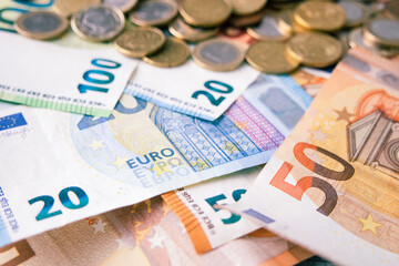 Money in euro currency euro banknotes and coins, loans, leasing. Saving money, crisis and bankruptcy