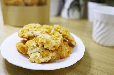 Cornflake cookies on wooden table. Selective focus