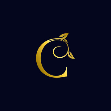 Luxury C Initial Letter Logo gold color, vector design concept ornate swirl floral leaf ornament with initial letter alphabet for luxury style