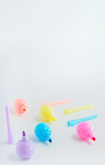 Perpective view of markers in pastel colors, short focus