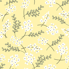 Seamless surface repeat vector pattern with little white flowers and green leaf branches on a light yellow background