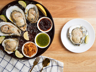 Oysters with Thai-style spicy sauce.