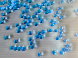 blue gel bullets and dark background