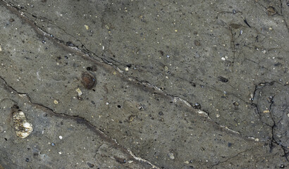 Black sea stone slabs textured.