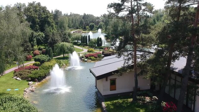 Aerial view, Mezhyhirya residence of the former president of Ukraine Viktor Yanukovych. Beautiful lakes with fountains. Drone