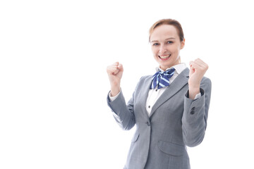 ガッツポーズをする制服を着た留学生