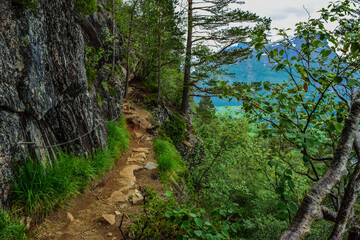 Hiking Rampestreken. The trail to Rampestreken Viewpoint, located at an altitude of 537 above Romsdal Fjord, Andalsnes. Norway.