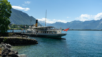 Swiss boat waiting for passengers at the Chillon's quay platform, 12 June 2020, Switzerland.